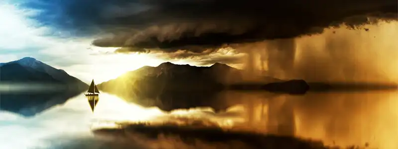 Small Business Risk Management - Image of sailboat sailing out of a storm